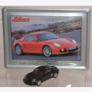 Schuco Modell 1:87 Porsche Cayman S schwarz mit Schild...